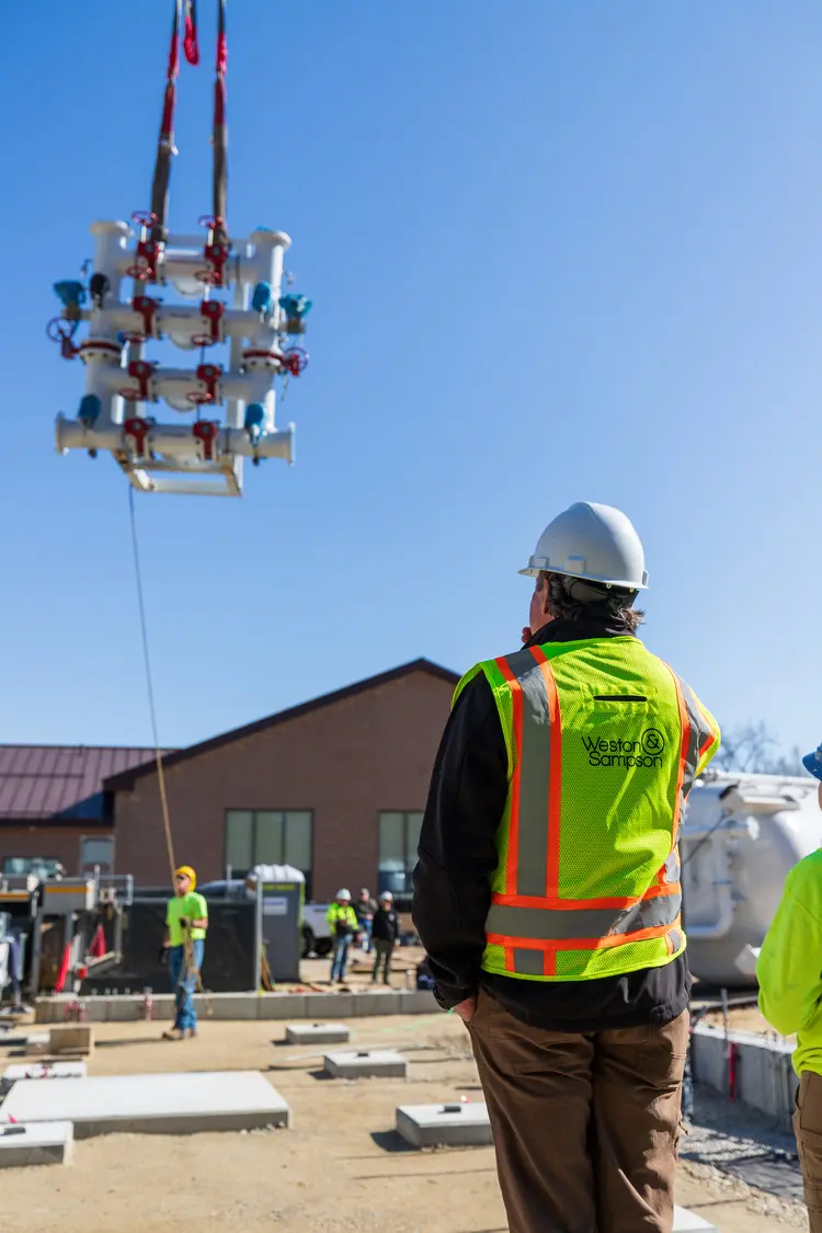 Photo of a person in a Weston and Sampson Vest at a construction site