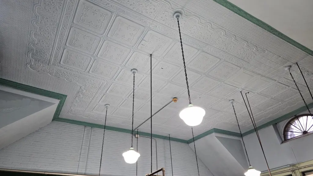 The decorative1800s ceiling.